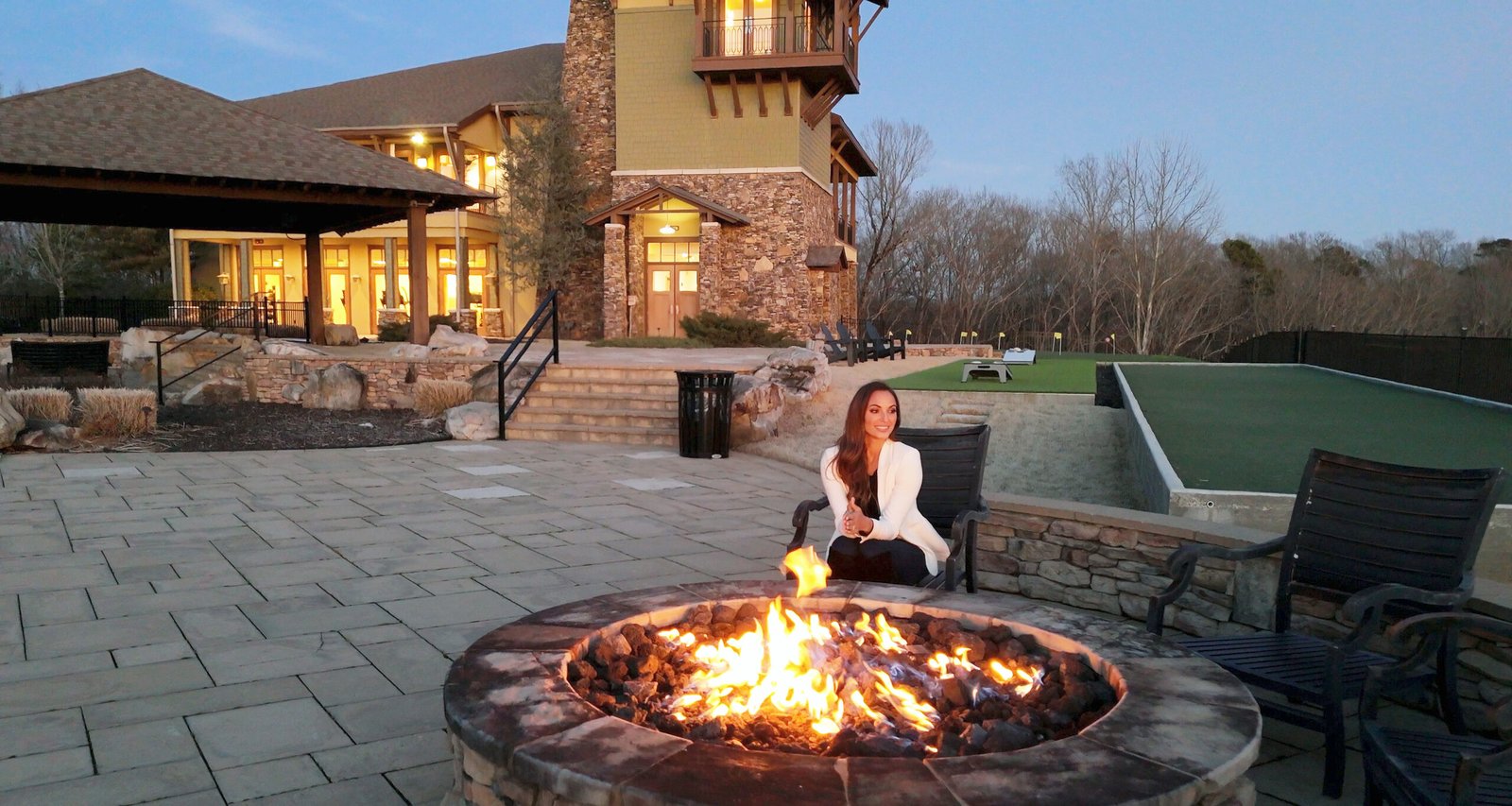 Tennessee lakefront community clubhouse with fire pit and outdoor lounge