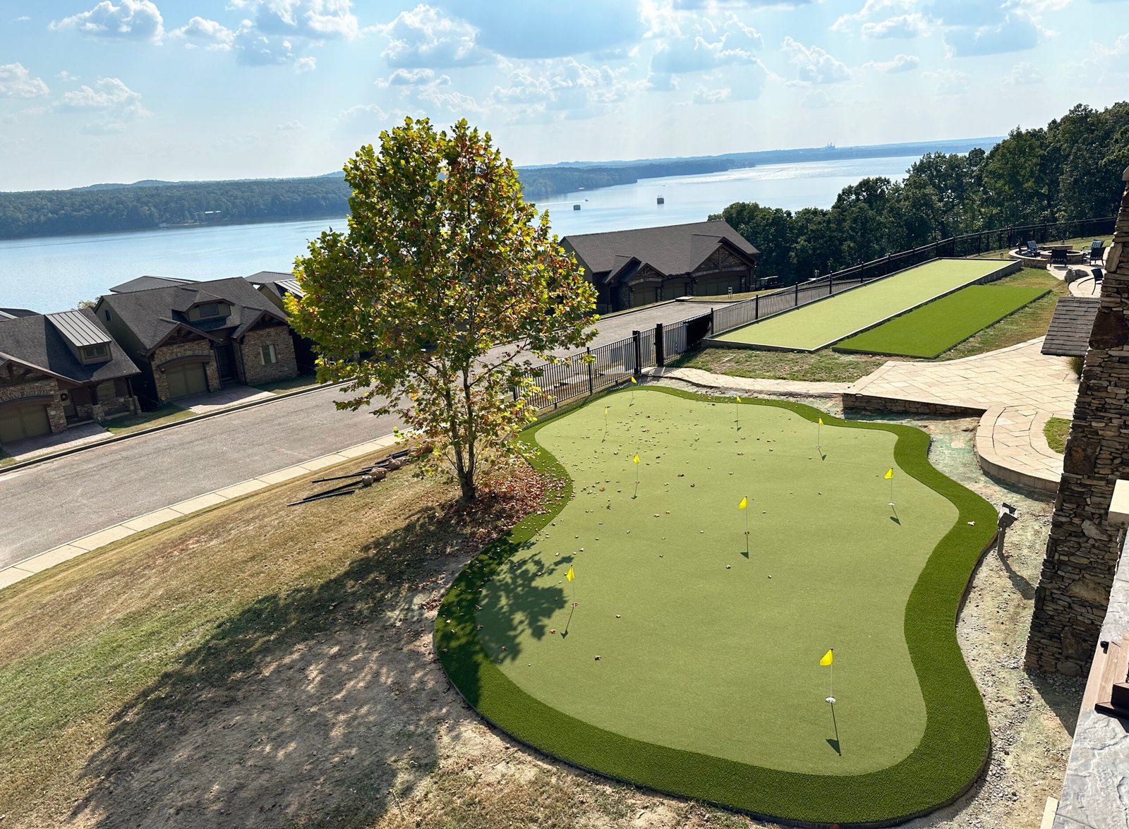 Tennessee gated lake community lifestyle amenities with golf practice area